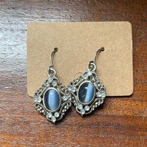 3/$12.  Silver Toned Dangle Earrings with a Blue Stone and Faux Diamonds.
